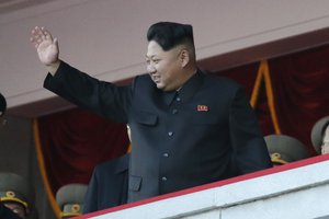 File -North Korean leader Kim Jong Un waves at a parade in Pyongyang, North Korea, Saturday, Oct. 10, 2015.