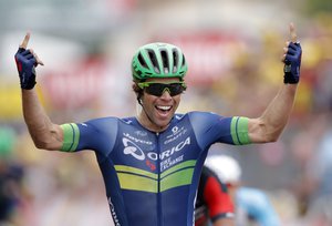 Australia’s Michael Matthews celebrates as he crosses the finish line to win the tenth stage of the Tour de France