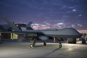 File - An MQ-9 Reaper equipped with an extended range modification sits on the ramp on Kandahar Airfield, Afghanistan, Dec. 6, 2015.