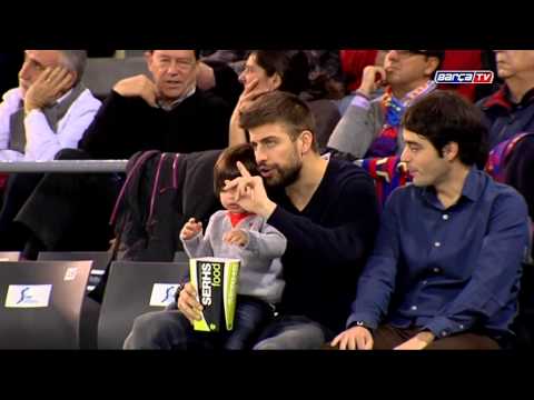 Gerard Piqué and his son Milan watching the FC Barcelona basketball team