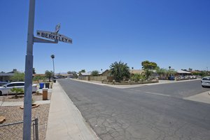 Near this block of West Berkeley Road in the Maryvale section of Phoenix, three persons died in one of a rash of shootings, shown here during the day Friday, July 8, 2016.