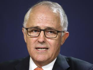 FILE - In this July 10, 2016 file photo, Australian Prime Minister Malcolm Turnbull speaks at the government offices in Sydney. Turnbull came under pressure from his own lawmakers on Thursday, July 14 to revise his economic agenda after his weakened coalition scraped through one of the nation's closest ever elections. (AP Photo/Rick Rycroft, File)