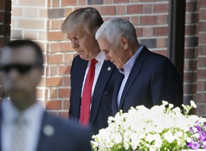 Republican presidential candidate Donald Trump leaves the Indiana Governor's residence with Gov. Mike Pence in Indianapolis, Wednesday, July 13, 2016.)