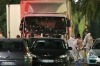 Police surround the truck that slammed into a Bastille Day crowd in Nice on Thursday.