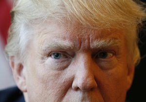 Republican Presidential candidate, Donald Trump  listens to a question during an interview after a rally in Virginia Beach, Va., Monday, July 11, 2016.