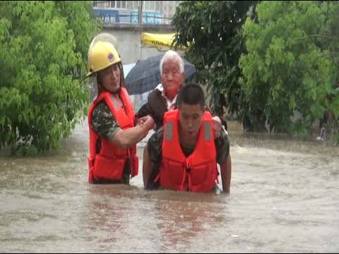 Firefighters Evacuate Hundreds after Flooding in Central China City