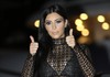 American television and social media personality,socialite, and model Kim Kardashian poses during a photocall at the Cannes Lions 2015, International Advertising Festival in Cannes, southern France, Wednesday, June 24, 2015.