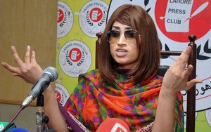 In this picture taken on June 28, 2016, Pakistani fashion model Qandeel Baloch speaks during a press conference in Lahore, Pakistan. Baloch, who recently stirred controversy by posting pictures of herself with a Muslim cleric on social media, was strangled to death by her brother, police said Saturday, July 16, 2016. (AP Photo/M. Jameel)