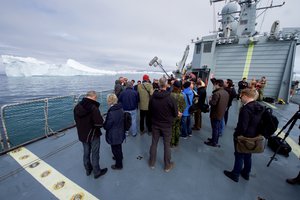 File - U.S. Secretary of State John Kerry receives a briefing fro a group of climate change scientists on June 17, 2016, as they cruise aboard the HDMS Thetis in the waters off Ilulissat, Greenland.