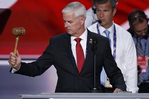 Rep. Steve Womack, R-Ark., tests out the gavel during a sound check before the opening session of the Republican National Convention in Cleveland, Monday, July 18, 2016.