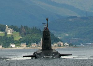 File - A Trident Vanguard class ballistic missile submarine leaving its base in the Firth of Clyde, Scotland.