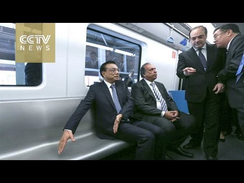 Chinese Premier Li Keqiang rides a made-in-China‬ subway in Brazil