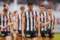 Scott Pendlebury leads his dejected Magpies from the MCG.