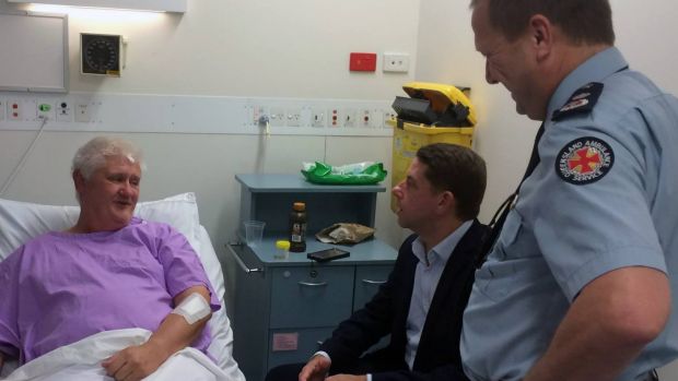 Ambulance Services Minister Cameron Dick and Queensland Ambulance Service Commissioner Russell Bowles visit the injured ...