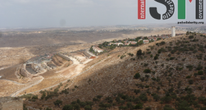 The illegal Israeli settlement of Nili overlooking village land.