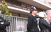 Police guard Imperial Typewriters from a strike March, August 1974