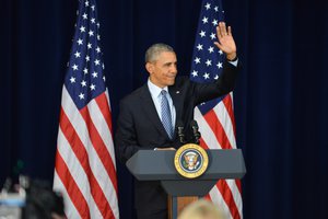 President Barack Obama greets attendees and prepares to deliver remarks at the 2016 Chief of Missions Conference in Washington, D.C., on March 14, 2016.