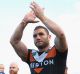 SYDNEY, AUSTRALIA - AUGUST 30:  Robbie Farah of the Wests Tigers applauds the crowd after the Tigers last home game of ...