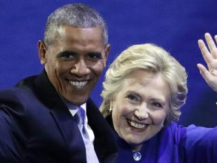 President Barack Obama and Democratic presidential candidate Hillary Clinton wave to the crowd during the third day of the Democratic National Convention, Wednesday, July 27, 2016, in Philadelphia. (AP Photo/John Locher)