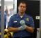 LOS ANGELES - NOVEMBER 22  A TSA agent waits for passengers to pass through a magnetometer at Los Angeles International ...