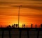 A friday night on Derby Wharf, WA. A sunset in July. Fisherfolk, grey nomads, kid's on bikes, blokes having a beer. I ...