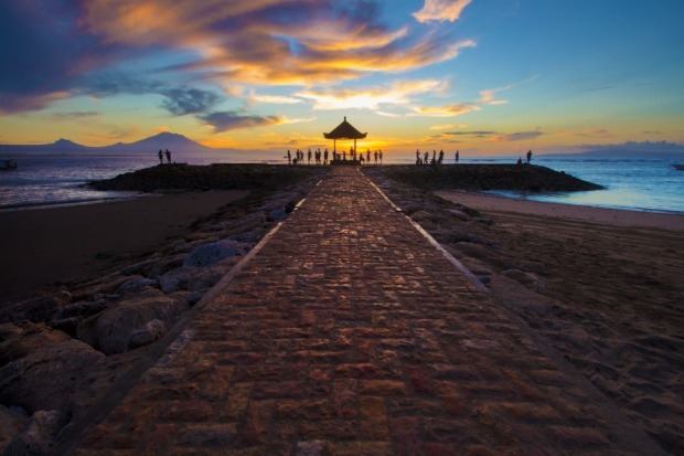 The stunning Sanur beach is one of the best places to view sunrise in all of Bali.
