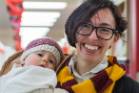 Avid Harry Potter fan Sara Epperson and her 13-month old daughter Milly, lined up at Whitcoulls South City, ...