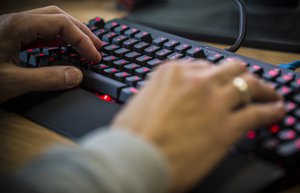 Using a computer keyboard.