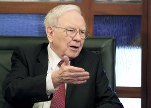 FILE - In this May 4, 2015 file photo, Berkshire Hathaway Chairman and CEO Warren Buffett speaks during an interview with Liz Claman on the Fox Business Network in Omaha, Neb. Berkshire Hathaway reports quarterly financial results on Friday, Aug. 7, 2015.