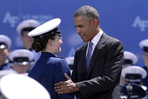 Barack Obama, The President of the United States, congratulates Cadet 1st Class Amy Silverbush at the U.S. Air Force Academy Class of 2016 at Falcon Stadium graduation in Colorado Springs, Colorado, June 2, 2016.