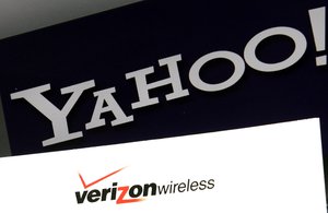 Logos are seen on a laptop, Monday, July 25, 2016, in North Andover, Mass. Verizon is buying Yahoo for $4.83 billion, marking the end of an era for a company that once defined the internet