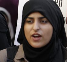 Muslim women protest outside the French embassy in London. 