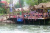 Australian tourists at the now deserted riverside bars in Vang Vieng.