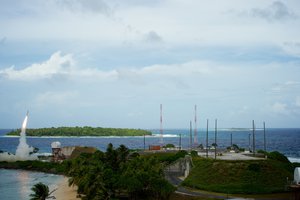 File - A Terminal High Altitude Area Defense (THAAD) interceptor missile is launched from Meck Island to intercept a ballistic missile target during a Missile Defense Agency integrated flight test.