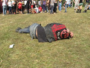 File - A drunk punk with a Tartan jacket at the Zvērā Festival in Latvia.