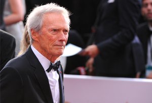 Clint Eastwood arrives at the Oscars on Sunday, Feb. 22, 2015, at the Dolby Theatre in Los Angeles.