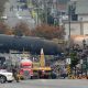 Crude oil tankers from the Montreal, Maine & Atlantic railway are seen July 9, 2013, in the heart of downtown Lac-Megantic, Quebec, where the runaway train exploded, killing 47 on July 6 of that year. Michael G. Seamans/Morning Sentinel