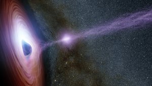 File - A supermassive black hole is depicted in this artist's concept, surrounded by a swirling disk of material falling onto it.