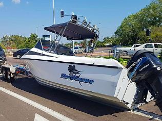 The boat fell off its trailer blocking Nightcliff Road. Picture: NT Police