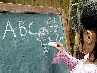 Your Child. Generic shots. Children. Kids. Girls. Blackboard. Chalk. Learning. Education.