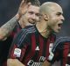 AC Milan's Alex Dias da Costa , center, celebrates with his teammates Juraj Kucka, left, and Carlos Bacca after scoring ...