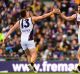 Skin in the game: Luke Shuey and Josh Kennedy celebrate a West Coast goal.