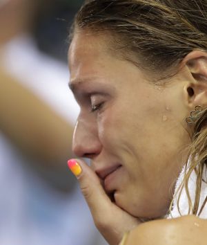 Russia's Yulia Efimova cries after placing second in the women's 100-meter breaststroke final.