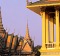 On the move ... a woman works in a rice field; the Royal Palace in Phnom Penh.