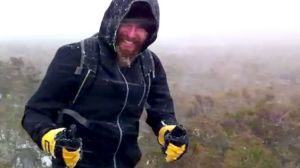 Tom Lievense enjoys the snowstorm on Bluff Knoll on Monday.