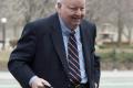 Suspended Senator Mike Duffy arrives at the courthouse for his trial in Ottawa, Friday, April 17, 2015.