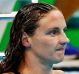 Hungary's Katinka Hosszu appears to be reminding commentators who did the swimming after winning gold with a new world ...