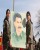 ybs_and_pkk_fighters_holding_up_a_painting_of_abdullah_calan_1.jpg