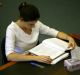 the university of queensland. a student studying in the library. fir 5 may 06. afr pix robert rough. generic, ...