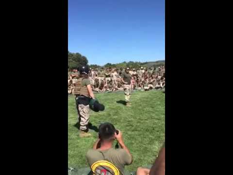 Female Marine Vs Male Marine in a round of pugile sticks.